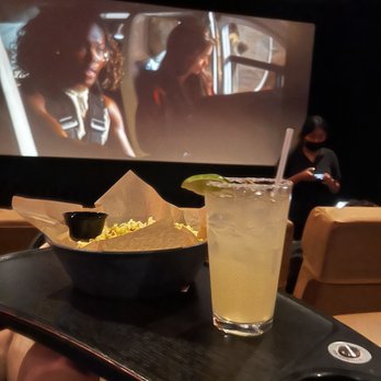 Studio Movie Grill - a bowl of popcorn and a drink - Cinema Near Me - Dallas, Texas