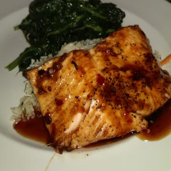 Stoney River - Grilled Salmon (Szechuan style), jasmine rice, and sautéed spinach. DELICIOUS!!! - Steakhouses Near Me - Annapolis, Maryland