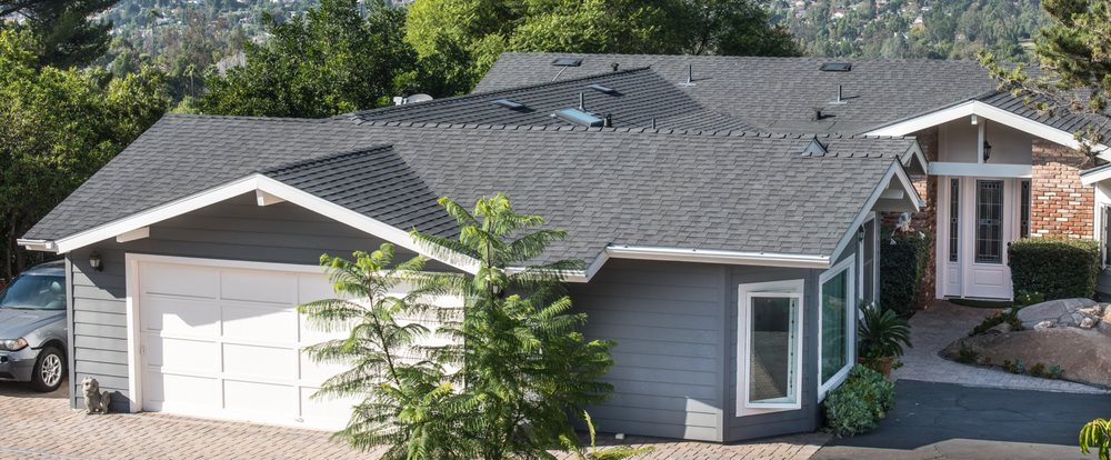 Slide of RT Roofing Specialist