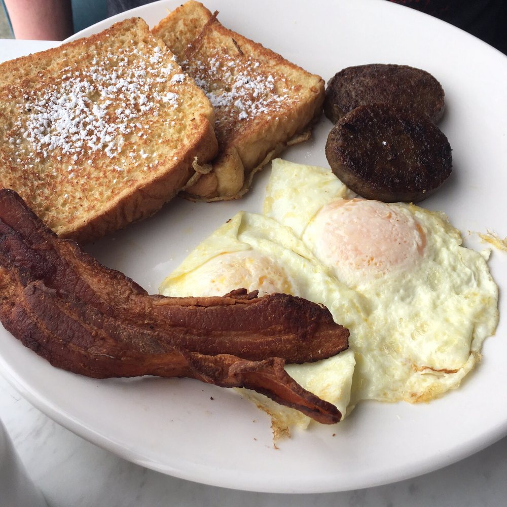 Eggsellent Cafe - Thick cut French toast with crispy bacon, it was very good. - Breakfast & Brunch Near Me - Frisco, Texas Eggsellent Cafe - Thick cut French toast with crispy bacon, it was very good. - Breakfast & Brunch Near Me - Frisco, Texas