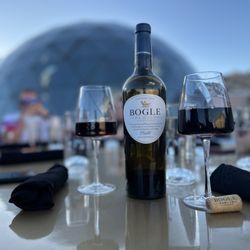 Sky Nova - Patio seating and wine