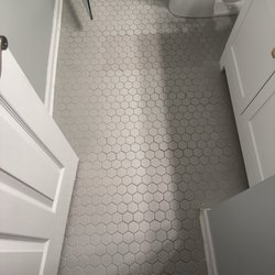 Restore Tile and Stone - Bathroom floor after grout cleaned