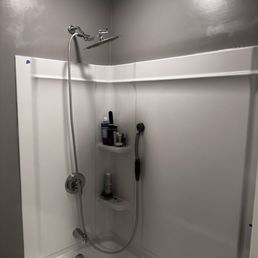 (Ignore the sheer and crooked shower head-- I JUST did the first coat of paint!)