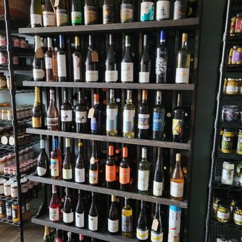 Dolcetto - a shelf full of wine bottles - Cheese Shops Near Me - Farmington, Michigan Dolcetto - a shelf full of wine bottles - Cheese Shops Near Me - Farmington, Michigan