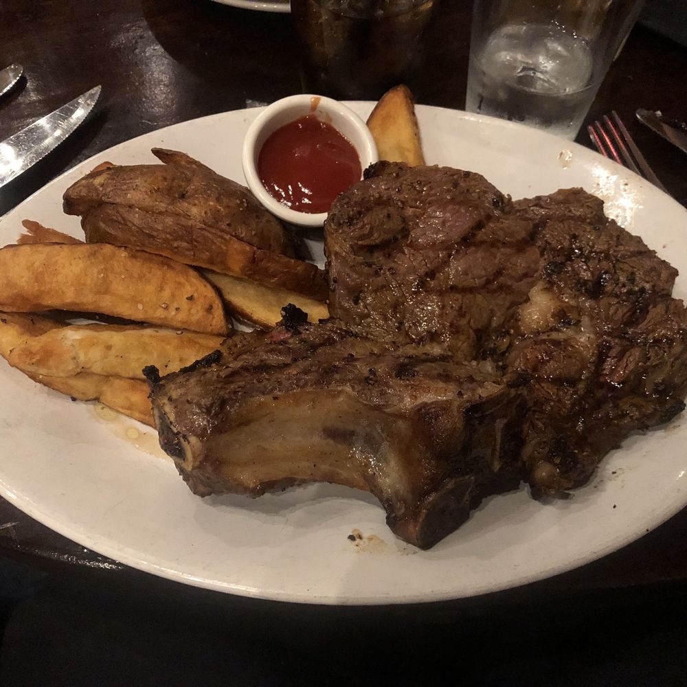 Carvers Steaks & Seafood - Fire Grilled Bone-in Ribeye - Steakhouses Near Me - Sandy, Utah