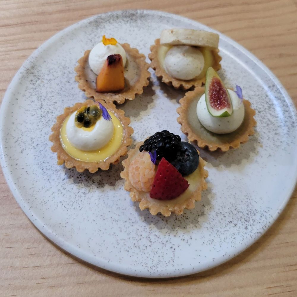 Pinecone Bakeshop Plus Cafe - MINI TART FLIGHT: Peach Earl Grey Tart, Banana Miso Caramel, Figgy Jin Xuan Oolong Tart, Mixed Berry Tart, Passion Fruit Tart - Coffee & Tea Near Me - Alhambra, California Pinecone Bakeshop Plus Cafe - MINI TART FLIGHT: Peach Earl Grey Tart, Banana Miso Caramel, Figgy Jin Xuan Oolong Tart, Mixed Berry Tart, Passion Fruit Tart - Coffee & Tea Near Me - Alhambra, California