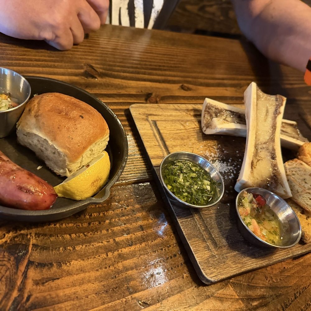 Bone marrow and chorizo with a dinner roll Bone marrow and chorizo with a dinner roll
