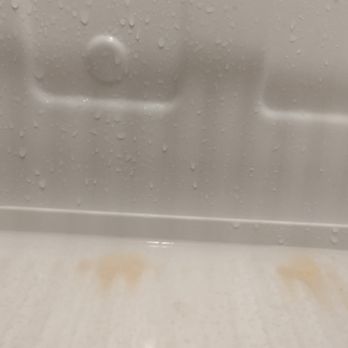 Midtown Realty and Management - Water Clearly Pooling On The Bottom Of The Fridge And Splashing Around - Property Management Near Me - Omaha, Nebraska Midtown Realty and Management - Water Clearly Pooling On The Bottom Of The Fridge And Splashing Around - Property Management Near Me - Omaha, Nebraska