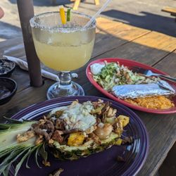 Pueblo Real Mexican - Steak, Chicken, Shrimp with pineapple....topped with cheese..and in a pineapple...amazing!