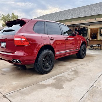 Japez Mobile Detailing - Rear passenger side 2009 Porsche Cayenne GTS  Color: GTS Red - Auto Detailing Near Me