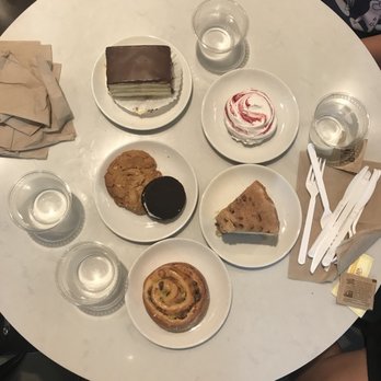 Flour Bakery + Cafe - From top to bottom: Boston cream pie, Raspberry meringue, Peanut butter cookie, whoopie pie, coffee cake, pain aux raisin - Coffee & Tea Near Me - Cambridge, Massachusetts