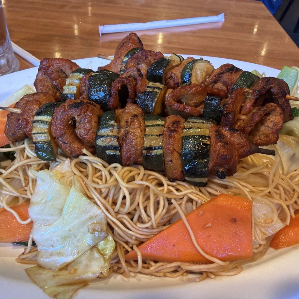 Basil Leaf Vietnamese Restaurant - Egg noodles stir fry with lemongrass beef -  hearty , satisfying and flavorful - Vietnamese Near Me - Albuquerque, New Mexico
