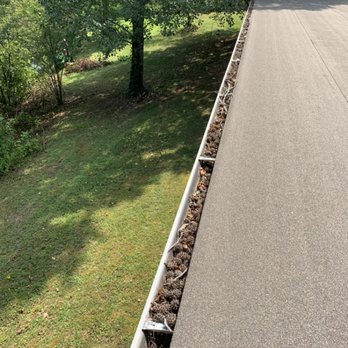 KR Gutters - Gutter packed with dirt and debris - Gutter Services Near Me KR Gutters - Gutter packed with dirt and debris - Gutter Services Near Me