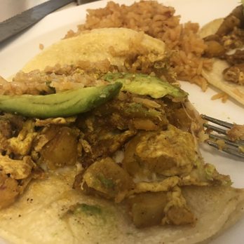 La Victoria - Chorizo, egg, cheese, and avocado on corn tortillas. Side of rice(best rice ever) - Mexican Near Me - Dallas, Texas