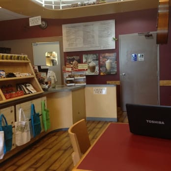 Serenity Coffee Shop - a laptop on a table - Coffee & Tea Near Me - Okeechobee, Florida Serenity Coffee Shop - a laptop on a table - Coffee & Tea Near Me - Okeechobee, Florida