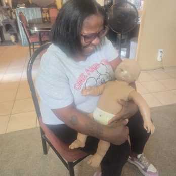Care Training Solutions - HOLDING THE BABY. - CPR Classes Near Me - Mesa, Arizona