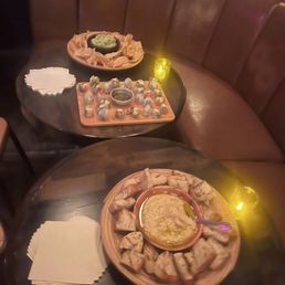 Guacamole, rice paper rolls and hummus Guacamole, rice paper rolls and hummus