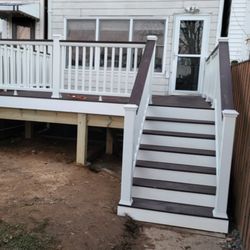 Deck and Restoration - New deck installation. Trex materials. December 2023.