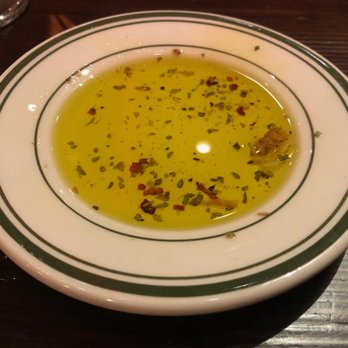 Feast Italian Kitchen - Olive oil with marinated herbs. - Italian Near Me - Old Bridge, New Jersey
