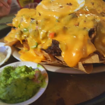 Chacho's - Half order of King Kong Nachos w/delicious pure Avocado on side! - Mexican Near Me - Houston, Texas Chacho's - Half order of King Kong Nachos w/delicious pure Avocado on side! - Mexican Near Me - Houston, Texas