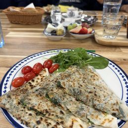 Gozleme filled with spicy spinach. A homemade flatbread of sorts. Delicious! Gozleme filled with spicy spinach. A homemade flatbread of sorts. Delicious!