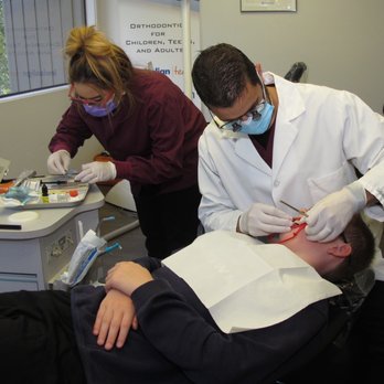 Silas D Dudley, DDS, MSD - Putting braces on!!! - Orthodontists Near Me Silas D Dudley, DDS, MSD - Putting braces on!!! - Orthodontists Near Me