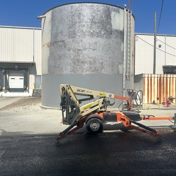 Hammer's Mobile Blasting - 24' tall water tank needed rust, primer and two coats of paint removed. - Sandblasting Near Me Hammer's Mobile Blasting - 24' tall water tank needed rust, primer and two coats of paint removed. - Sandblasting Near Me