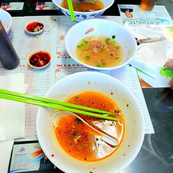 Mi La Cay - a woman eating a bowl of soup - Chinese Near Me - Garden Grove, California Mi La Cay - a woman eating a bowl of soup - Chinese Near Me - Garden Grove, California