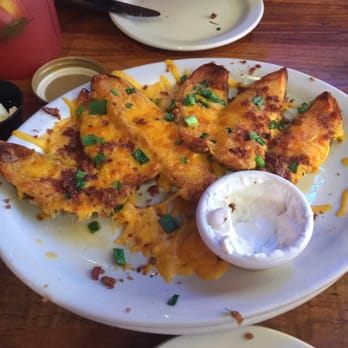Logan's Roadhouse - Potato skins for the appetizer. Simply delicious! - Steakhouses Near Me - Flowood, Mississippi Logan's Roadhouse - Potato skins for the appetizer. Simply delicious! - Steakhouses Near Me - Flowood, Mississippi