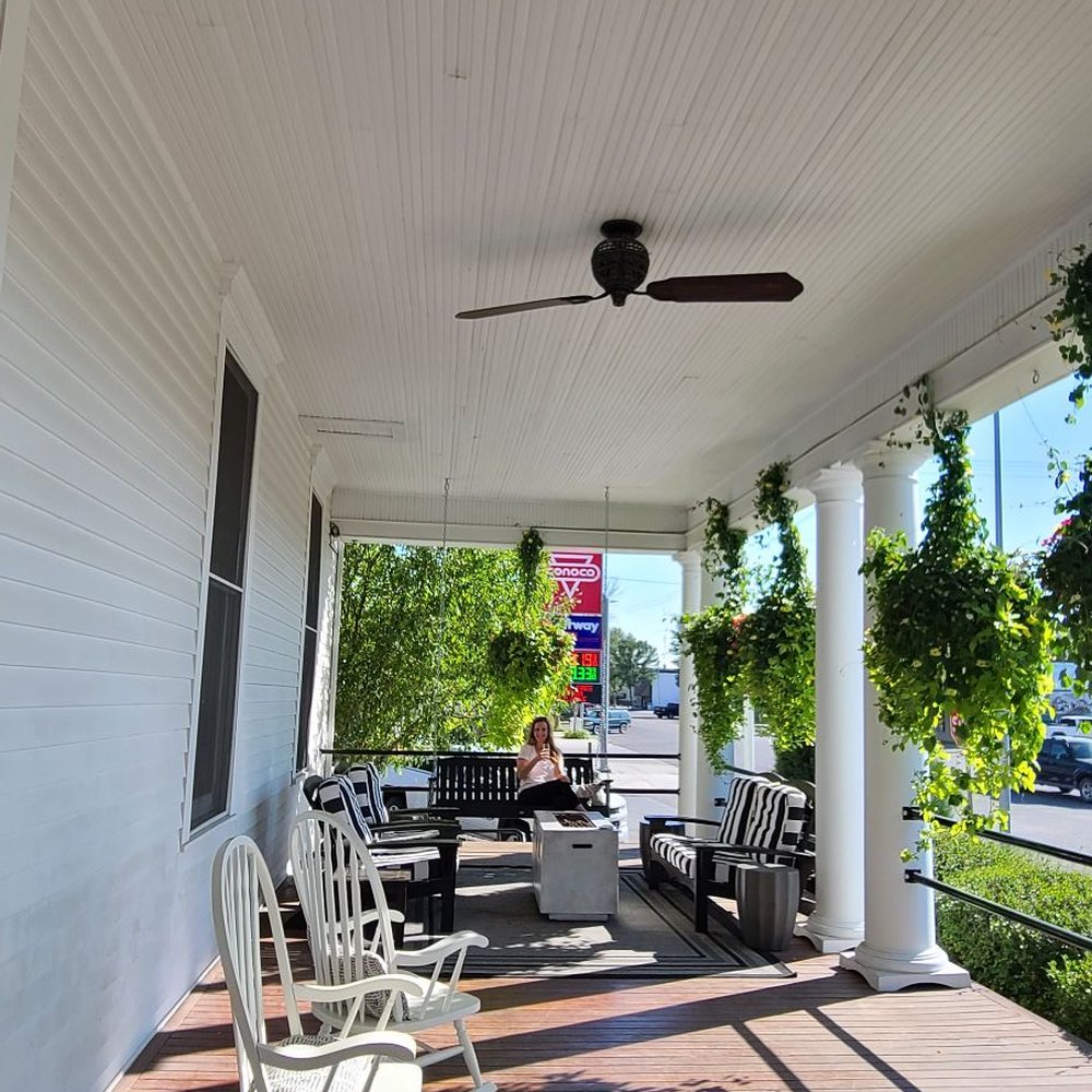 Sacajawea Hotel - Seating area in front of hotel - Hotels Near Me - Three Forks, Montana
