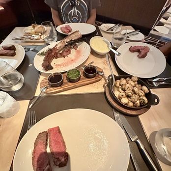 William B's Steakhouse - Medium rare tomahawk, red wine & chimichurri sauces, whipped mashed potatoes, sautéed mushrooms - Seafood Near Me - Las Vegas, Nevada William B's Steakhouse - Medium rare tomahawk, red wine & chimichurri sauces, whipped mashed potatoes, sautéed mushrooms - Seafood Near Me - Las Vegas, Nevada