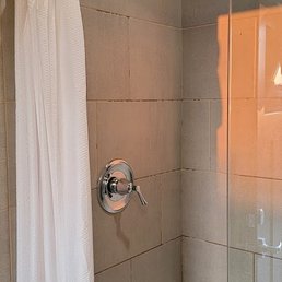 Whoever designed this shower with the small instructions should be fired. No brains in this design whatsoever.