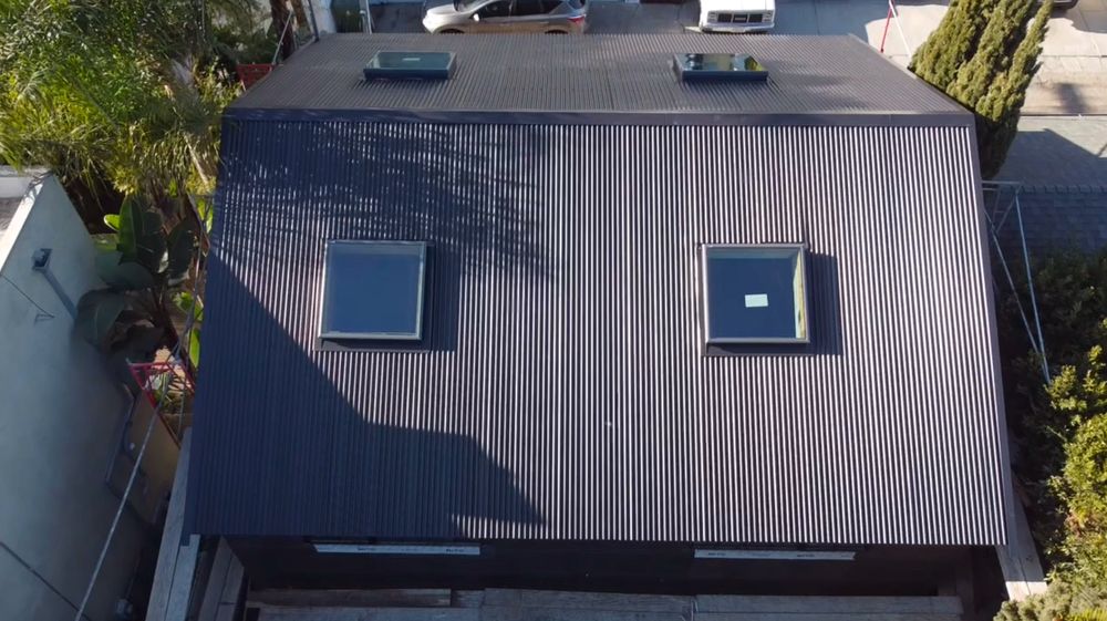 Slide of Honey Badger Roofing