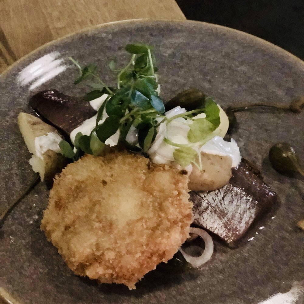 Ekte - Smørrebrød - Onion herring, potatoes, deep fried egg, black pepper, crème fraiche, capers - Scandinavian Near Me - London, XGL