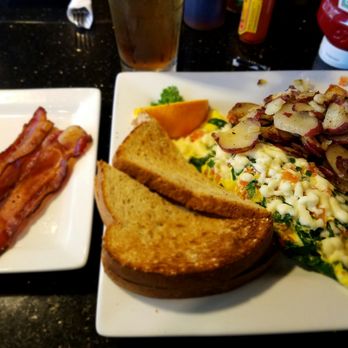 Keke's Breakfast Cafe - Greek omlete w/extra cheese and added side order of bacon - Breakfast & Brunch Near Me - Winter Park, Florida Keke's Breakfast Cafe - Greek omlete w/extra cheese and added side order of bacon - Breakfast & Brunch Near Me - Winter Park, Florida