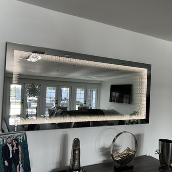 CircuitCity Electric - Installation of a mirror light in a living room. - Electricians Near Me CircuitCity Electric - Installation of a mirror light in a living room. - Electricians Near Me