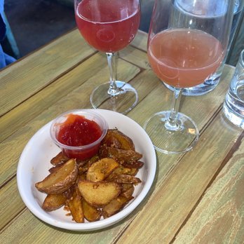 7th & Carson - Raspberry mimosa, blood orange mimosa, and potato wedges - New American Near Me - Las Vegas, Nevada 7th & Carson - Raspberry mimosa, blood orange mimosa, and potato wedges - New American Near Me - Las Vegas, Nevada