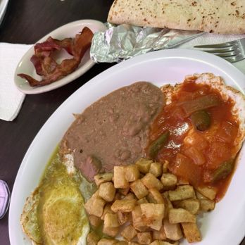 Lupita Texmex Restaurant - Huevos Divorciados + side bacon - Tex-Mex Near Me - Galveston, Texas Lupita Texmex Restaurant - Huevos Divorciados + side bacon - Tex-Mex Near Me - Galveston, Texas