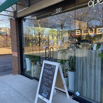 Blue Mountain Coffee Roasters - Welcome sign outside the coffee shop - Coffee & Tea Near Me - Suwanee, Georgia Blue Mountain Coffee Roasters - Welcome sign outside the coffee shop - Coffee & Tea Near Me - Suwanee, Georgia