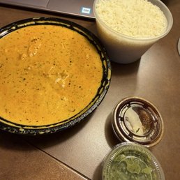 Chicken Tikka Masala with Rice and sauces Chicken Tikka Masala with Rice and sauces