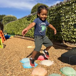 Sunshine House - Outdoor agility courses, stepping stones, and active play that keep young learners energized and developing balance.