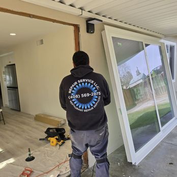 Repair Specialist 1 - Mario is prepping the sliding glass door opening for the new install. - Appliances & Repair Near Me - Campbell, California Repair Specialist 1 - Mario is prepping the sliding glass door opening for the new install. - Appliances & Repair Near Me - Campbell, California