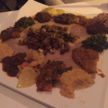 Das Ethiopian - Special beef tibs with the vegetarian sampler (x2) - for party of three we almost finished ! - Ethiopian Near Me - Washington, DC, District of Columbia Das Ethiopian - Special beef tibs with the vegetarian sampler (x2) - for party of three we almost finished ! - Ethiopian Near Me - Washington, DC, District of Columbia