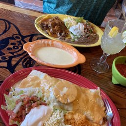 two plates of mexican food two plates of mexican food