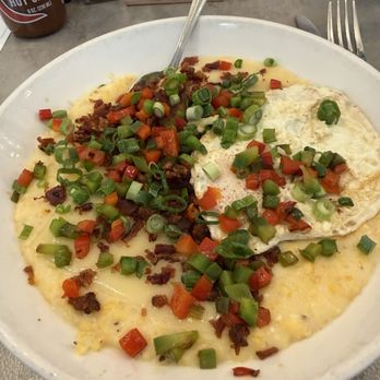 KISS Cafe - Grits with bacon, cheese, peppers and an added egg. - Breakfast & Brunch Near Me - Johns Island, South Carolina KISS Cafe - Grits with bacon, cheese, peppers and an added egg. - Breakfast & Brunch Near Me - Johns Island, South Carolina
