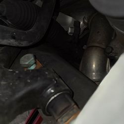 Vannoy's Tires, Inc. Tire Pros - Control arm bolt very loose and about to fall out.