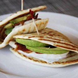 Kaitlynn's Deli & Ice Cream Shop - Lydia's chicken sandwich special- Grilled chicken, thick sliced bacon, fresh avocado, and hidden valley ranch on a pita