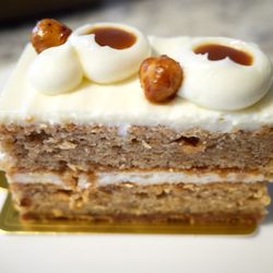 Banana hazelnut cake - local apple bananas, cream cheese frosting, toffee bits, Koloa Rum caramel, candied hazelnuts