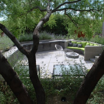 Realm - a view of a backyard with a fire pit - Landscaping Near Me - Tucson, Arizona