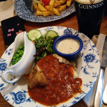 The Liberty Bounds - Jacket potato with bean chili and a side of peas. - Pubs Near Me - London, XGL The Liberty Bounds - Jacket potato with bean chili and a side of peas. - Pubs Near Me - London, XGL